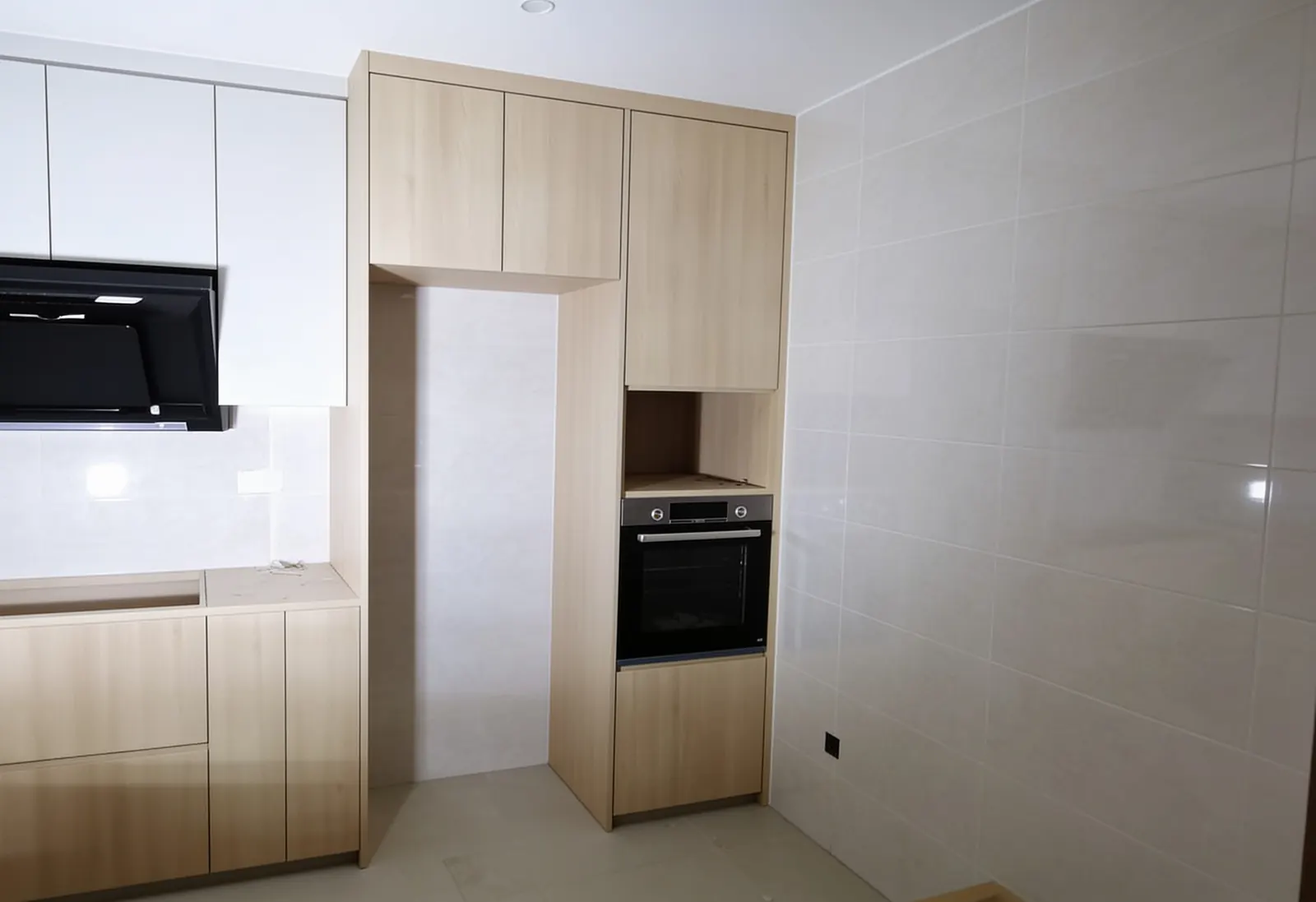 Kitchen run and oven tower installed in a 3-room HDB flat in Punggol